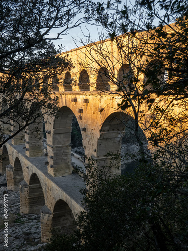 The bridge of Gard at sunset in Provence, South of France © Yves