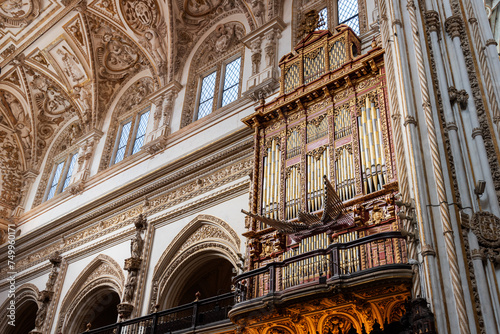 Musical organ of the Christian chapel of the cathedral mosque of Cordoba, minor organ on the epistle side, right in front of the altar. photo