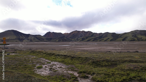 Obraz na płótnie Landmannalaugar is a location in Iceland's Fjallabak Nature Reserve in the Highlands. It is on the edge of the Laugahraun lava field. This lava field was formed by an eruption in 1477. w salonie
