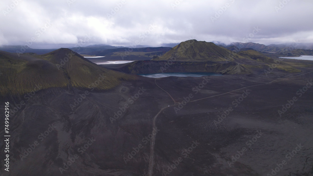 Blahylur lake, spelled Bláhylur in Icelandic and also known as Hnausapollur, is a stunning crater lake located near Landmannalaugar in the Southern Highlands, Iceland.