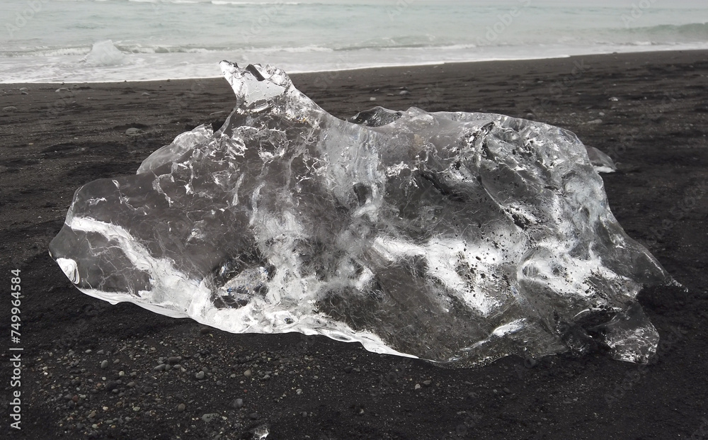 The Diamond Beach is a black volcanic sand beach next to Jökulsárlón Glacier Lagoon on the South Coast of Iceland. Chunks of glacial ice washed ashore.