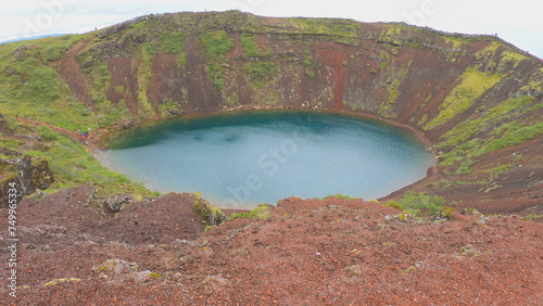 Obraz na płótnie The Kerid is a volcanic crater lake located in the Grímsnes area in south Iceland. This vibrant blue gem is approximately 55 meters deep, 170 meters wide, and 270 meters in circumference. w salonie