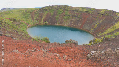 Obraz na płótnie The Kerid is a volcanic crater lake located in the Grímsnes area in south Iceland. This vibrant blue gem is approximately 55 meters deep, 170 meters wide, and 270 meters in circumference. w salonie