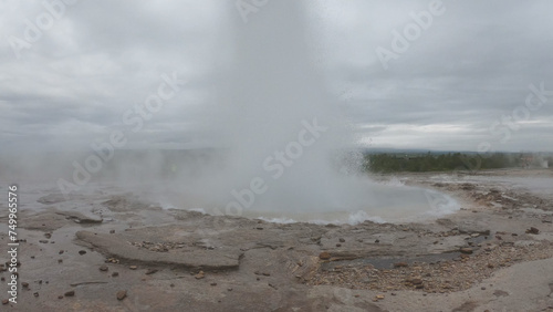 Obraz na płótnie Strokkur is found in the Geysir Geothermal Area, Iceland, named after the Great Geysir. It is the greatest active geyser on site. Geysir itself is in a period of inactivity. w salonie