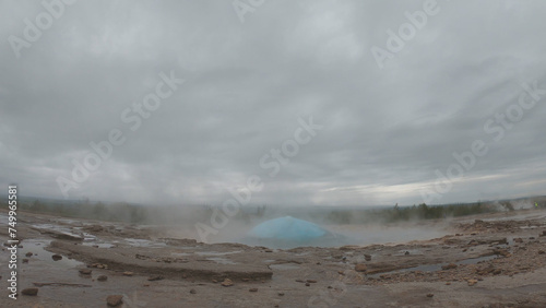 Obraz na płótnie Strokkur is found in the Geysir Geothermal Area, Iceland, named after the Great Geysir. It is the greatest active geyser on site. Geysir itself is in a period of inactivity. w salonie