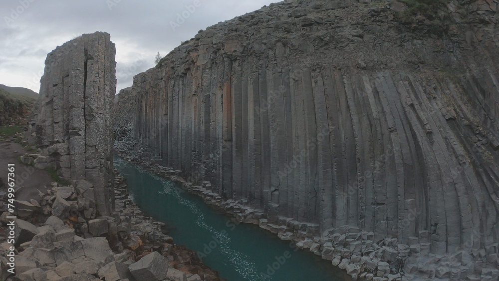 Studlagil Canyon can be found in East Iceland in the Glacier Valley called Jokuldalur. With the largest number of basalt rock columns in Iceland and a stunning blue-green glacial river.