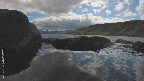 Hvammsvík Hot Springs is perched right on the edge of the Hvalfjordur fjord in West Iceland. photo