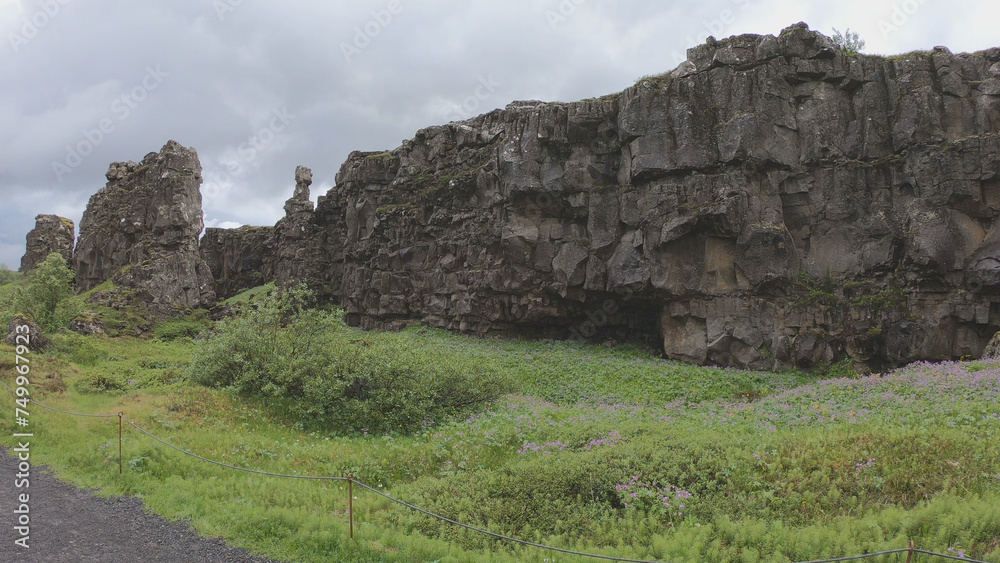 Almannagja is an eight-kilometer-long gorge within Pingvellir National Park, which marks the edge of the North American plate and the beginning of the Þingvellir rift valley in Iceland.
