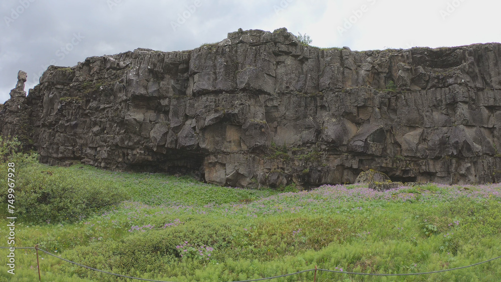 Almannagja is an eight-kilometer-long gorge within Pingvellir National Park, which marks the edge of the North American plate and the beginning of the Þingvellir rift valley in Iceland.