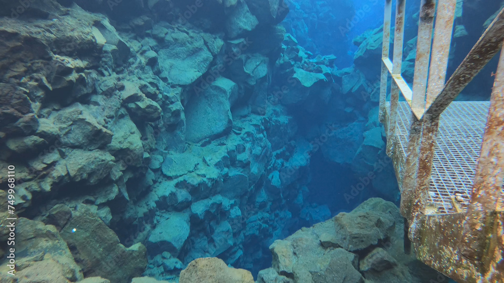 Silfra is a fissure between the North American and Eurasian tectonic plates with over 100m visibility underwater in Thingvellir National Park, Iceland.