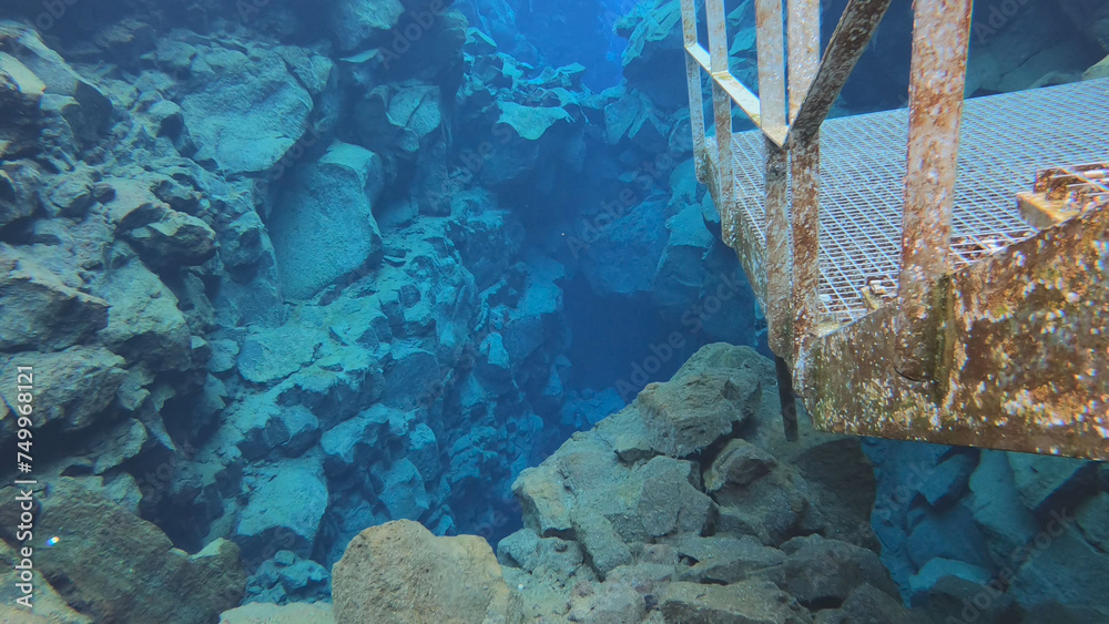 Silfra is a fissure between the North American and Eurasian tectonic plates with over 100m visibility underwater in Thingvellir National Park, Iceland.