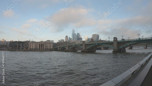 Obraz na płótnie Boats on the River Thames with the Southwark Bridge and skyscrapers in the background, London, England, United Kingdom. w salonie