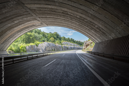 Tunnel on a highway. A tunnel in a mountain on a country highway. © Denis Rozhnovsky