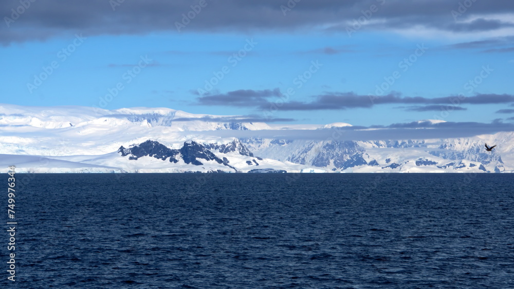 Snow covered mountains around a bay at Portal Point, Antarctica Snow covered mountains around a bay at Portal Point, Antarctica