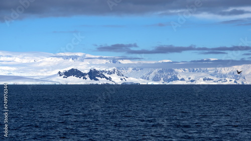 Snow covered mountains around a bay at Portal Point, Antarctica