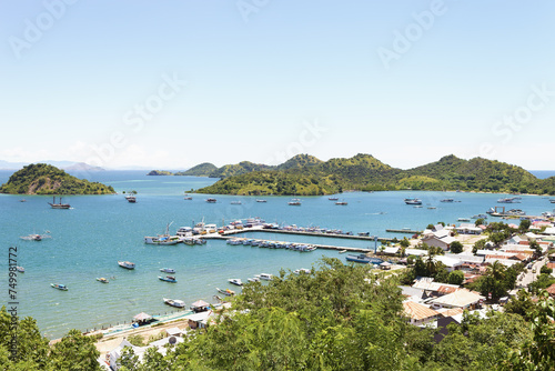 Labuan Baggio, Flores, 05/03/2011. View from the city to the sea, marina, ships.