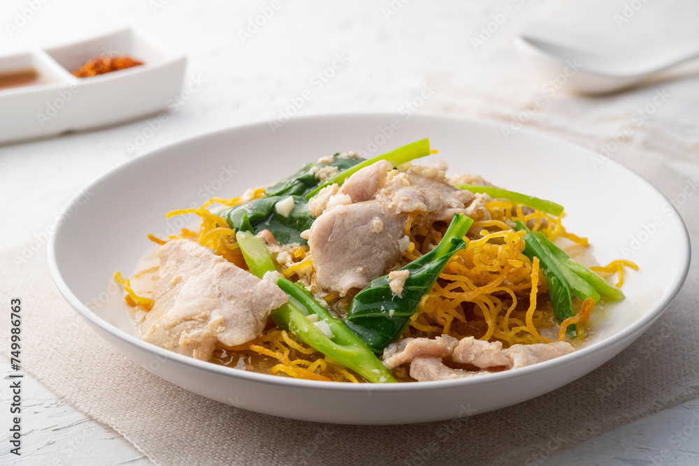 Crispy egg noodles with Chinese broccoli and sliced pork in Thick Gravy sauce