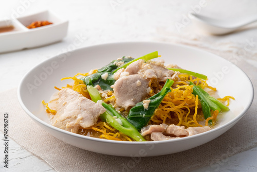 Crispy egg noodles with Chinese broccoli and sliced pork in Thick Gravy sauce