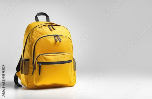 One backpack on a empty background with copyspace. Back to school concept. 