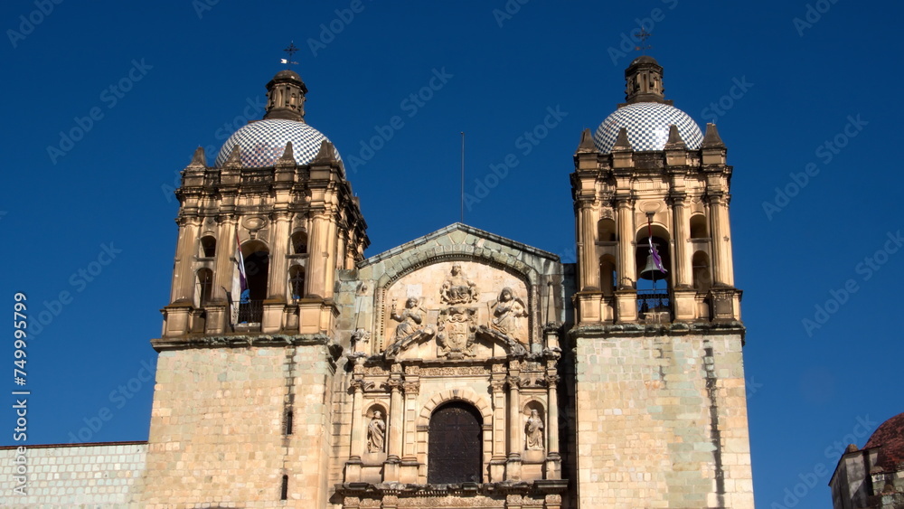 Front facade with bell towers on the Church and Convent of Santo Domingo de Guzman in Oaxaca, Mexico