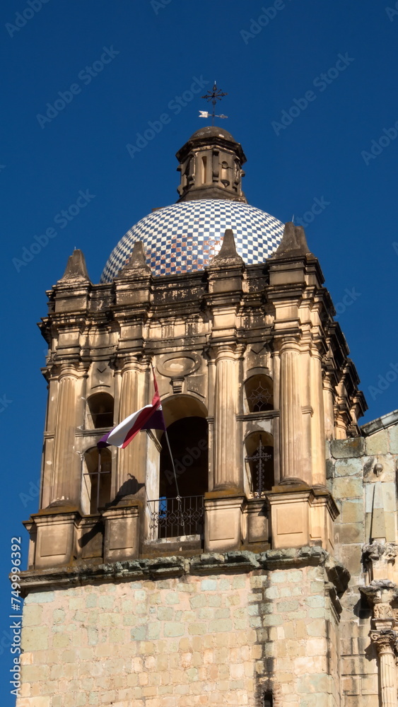 Tiled bell tower on the Church and Convent of Santo Domingo de Guzman in Oaxaca, Mexico