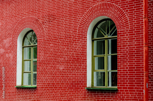 Brick wall with arched windows. © Сергей Лаврищев