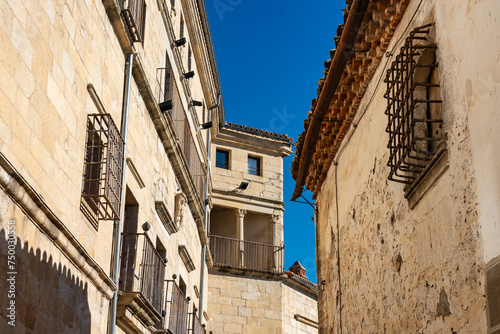 Old stone houses and very old church tower in the Unesco city of Trujillo, Extremadura.