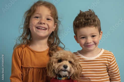 two happy children with their dog