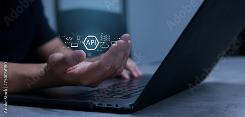 close up programmer man hand show processing and procedure of API software programming to synchronize and transfer data from database to website for technology business concept photo