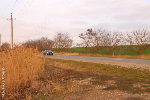 A car driving down a road