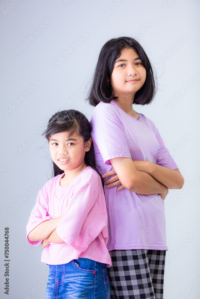 Asian sisters and sisters isolated white background,Two Asian women, white background Asian sisters and sisters isolated white background,Two Asian women, white background