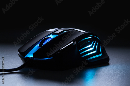 Black gaming mouse with light blue light