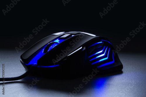 Black gaming mouse with blue light