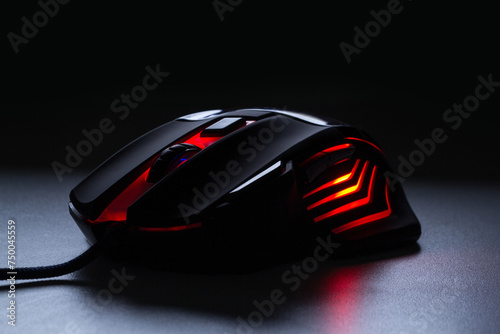 Black gaming mouse with red light