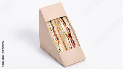 Sandwich in paper isolated on white