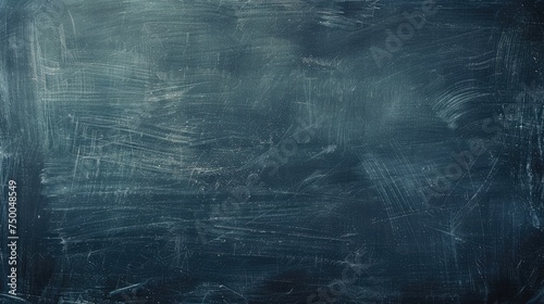 A blank dark blue chalkboard texture background. back to school background with copy space photo
