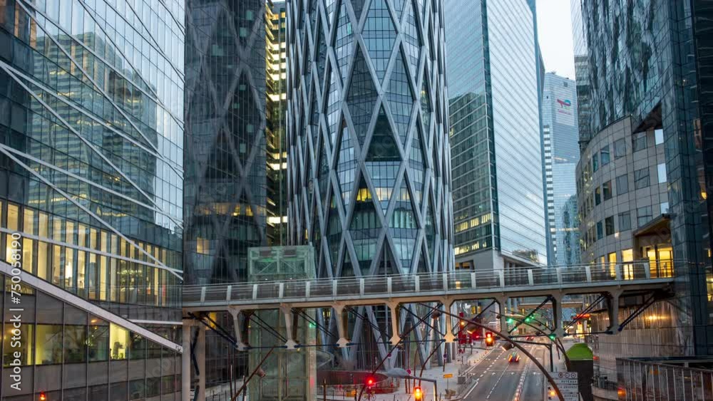 Paris, France. Skyscrapers of modern business and financial district Defense with road traffic. Panoramic motion timelapse Paris, France. Skyscrapers of modern business and financial district Defense with road traffic. Panoramic motion timelapse