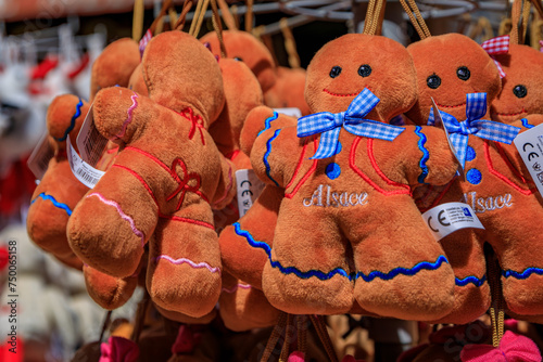 Strasbourg, France - May 31 2023: Traditional Alsatian gingerbread man plush toys on display at a souvenir store in the old town on Grande Ile
