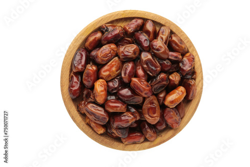 Fresh dates in wooden bowl isolated on white background. Close up