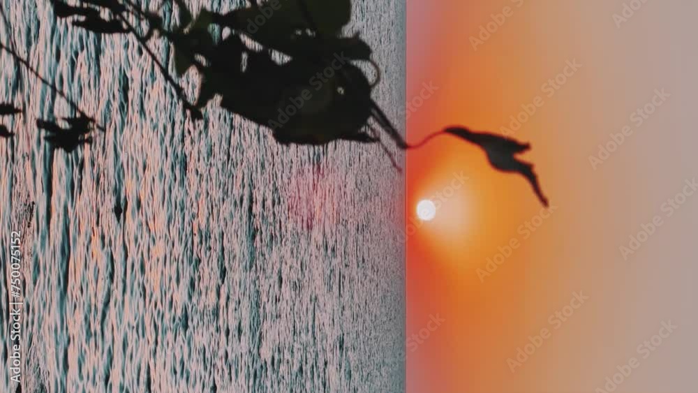 Panoramic view of the Black Sea coast at sunset. A picturesque view of the sunset sky in the evening. View of the golden sunset and waves on the sea near the Kiselyov rock. Tuapse 4K