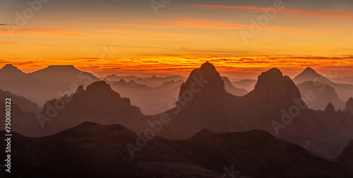 Hoggar landscape in the Sahara desert, Algeria. A view from Assekrem of the sunrise over the Atakor mountains
