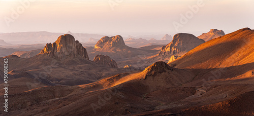 Hoggar landscape in the Sahara desert  Algeria. A view from Assekrem of the mountains and basalt organs that rise up in the morning light.