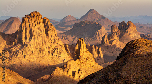 Hoggar landscape in the Sahara desert, Algeria. A view of the mountains and basalt organs that stand around the dirt road that leads to Assekrem.