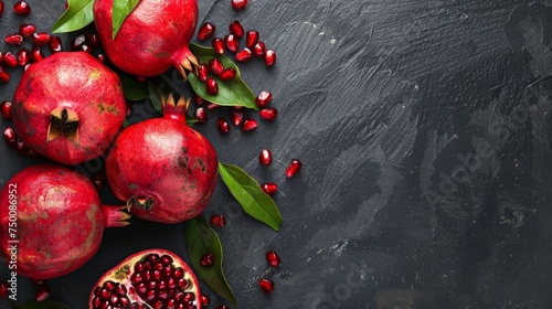 pomegranate fruit on a gray background © Сергей Безрученко