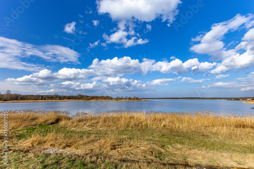 Water reservoir in Poraj in spring on a lake © dominikspalek.pl