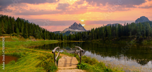 Majestic landscape of Antorno lake with famous Dolomites mountain  photo