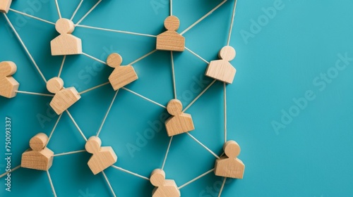 Social media networking. Network with members connected with each other. Group of people. Communication, teamwork, community, society. Abstract concept with wooden pieces on blue background.