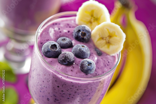 A vibrant purple smoothie made with blueberries, soy milk, and bananas, rich in antioxidants