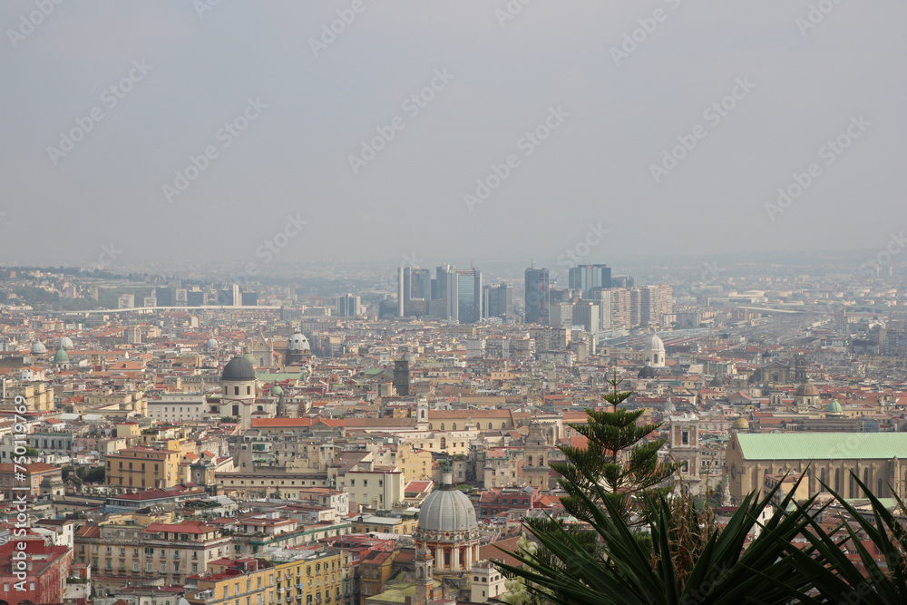 Panoramic view of City of Naples, from the top of San Elmo Castle in the morning fog.