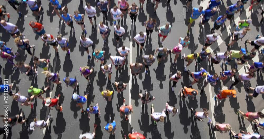 4K - Wide angle view of a blurred motion of marathon